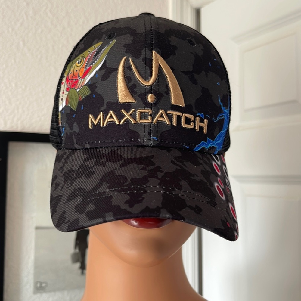 NWOT MAXCATCH TROUT FISHING CAP. Bright gold embroidery on black/green camo.
